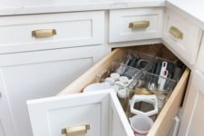 14 a storage drawer in the corner is a nice idea to use that awkward space that is often unused