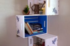18 a corner shelf unit made of Knagglig boxes painted inside and stenciled outside and attached to each other
