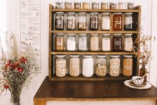19 an open pantry idea with a shelving unit or several ones and the same jars with sharpie labels