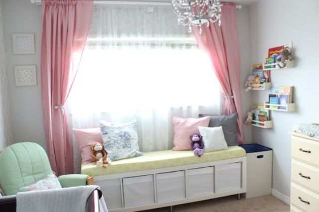 an upholstered IKEA bench with white Drona boxes is a smart and simple storage idea