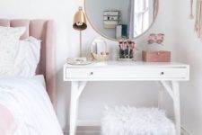 22 a simple dressing table that doubles as a bedside table with a stool covered with faux fur