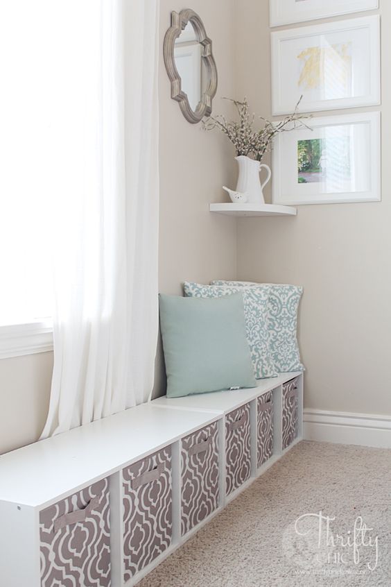 hide a cute play area in your living room without it looking like a mess - just use Drona boxes adding handles to them