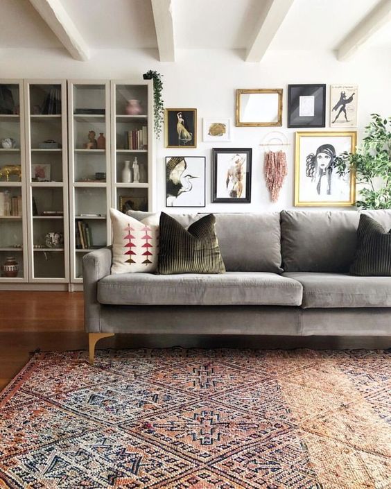 a vintage patterned rug adds texture and pattern to the space and makes it more refined