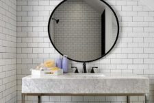 24 a vanity of a stone top and a frosted glass shelf underneath looks contemporary and bold
