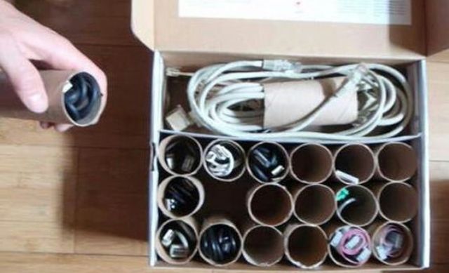 hiding cords using toilet paper rolls is a stylish and smart idea to try