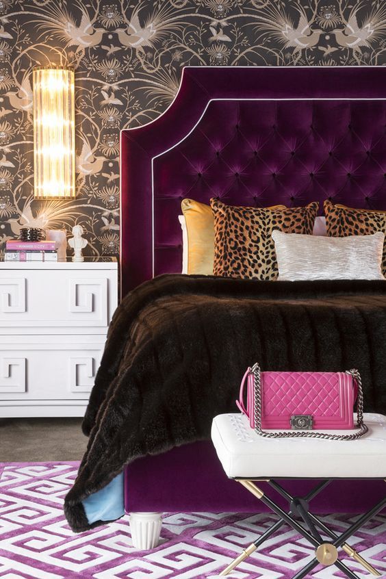 a velvet upholstered bed and a tufted headboard with white framing for accenting the piece