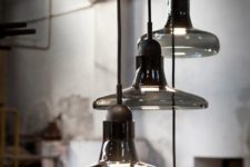 25 such a smoked glass pendant lamps cluster will bring an edgy feel to any space in your home