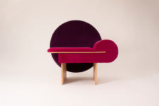 02 The base is made of wood, the chair is upholstered in hot pink and the back is a purple circle