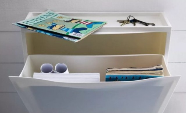 an IKEA Trones piece is a perfect skinny floating storage console for a small entryway