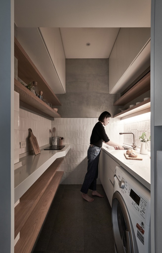 The kitchen accomodates some appliances and features much storage plus countertops to use for cooking and eating The kitchen accomodates some appliances and features much storage plus countertops to use for cooking and eating