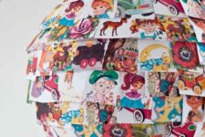 03 an IKEA Rgolit lampshade personalized with colorful vintage picture books is a veyr whimsical hack