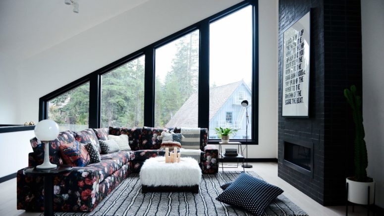 attic living space is an interesting solution for a cold climate region This is a cozy attic space with graphic touches and much light coming from outside