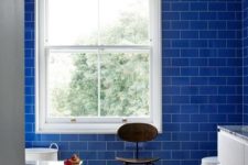 05 bold blue subway tiles on the wall make a statement and add an edge as subway tiles are a hot trend