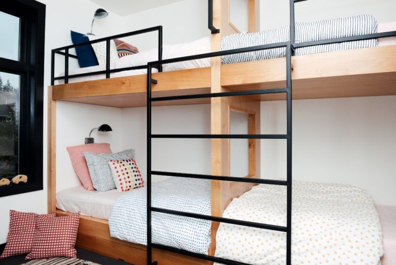 The kids' room features a bunk bed with lots of colorful pillows