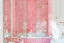 06 a hot pink geometric tile space accents the white bathtub, which is also clad with them