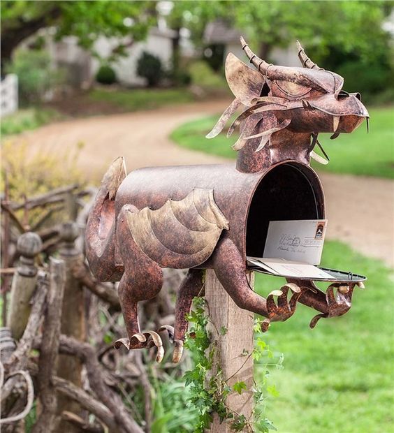 a metal dragon mailbox is a gorgeous idea for geeks, fantasty fans and many others - it won't be unnoticed