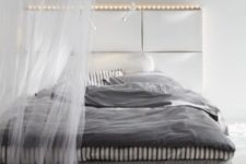 07 use IKEA Trones to create a comfy headboard with storage and lights, ideal for a contemporary space