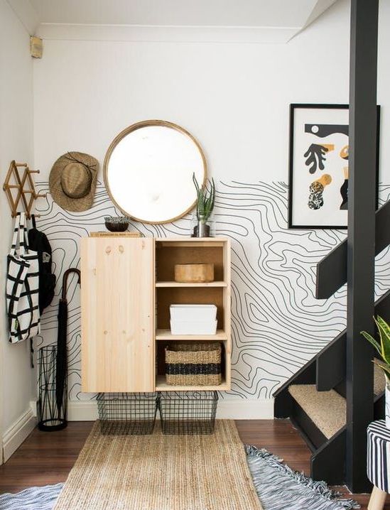 you may go for printed wallpaper only on half of the wall for less impact on the space