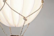 08 a beautiful hot air balloon lamp using rope and an IKEA Regolit lampshade is a gorgeous and dreamy DIY