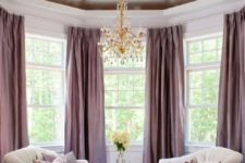 08 a cozy awkward nook with a domed ceiling and a skylight plus metallic cover on the ceiling