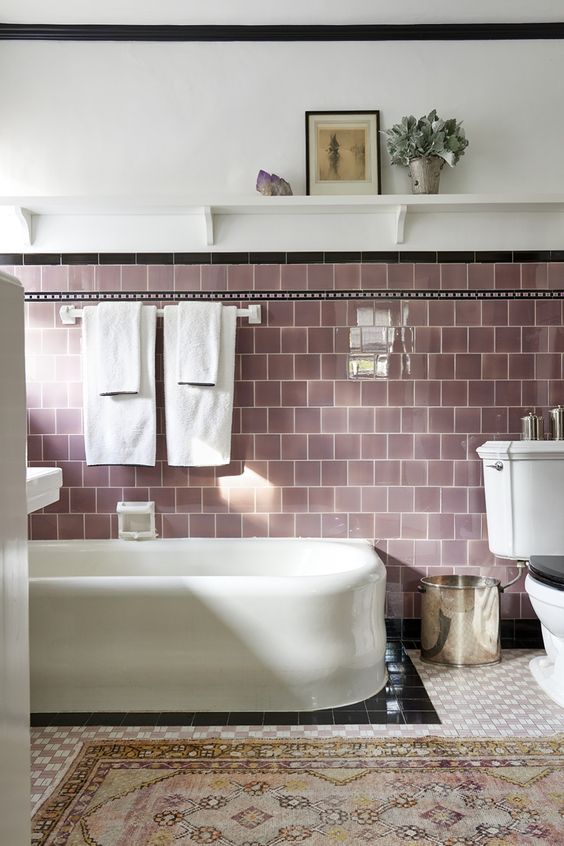 a bathroom with lilac tiles looks very soothing and welcoming, it's a great color for relaxation