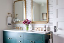 10 a teal bathroom vanity with brass handles adds style and colro to the space