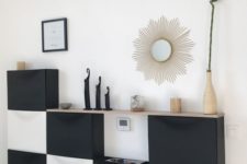 a living room console made of IKEA shoe cabinets