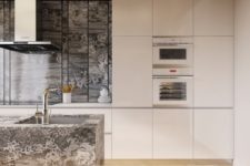 14 a minimalist kitchen with sleek white cabinets and a gold ceiling with a simple design, stone adds texture