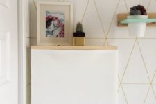 15 a simple IKEA Trones hack with a light-colored wooden tabletop makes up a floating console table
