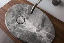 16 a fantastic oval stone modern sink to make a statement in a bathroom