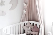 a simple yet super stylish curved crib for a baby