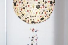 17 a fun pendant lamp of an IKEA Regolit lampshade and colorful buttons plus buttons hanging down for decor
