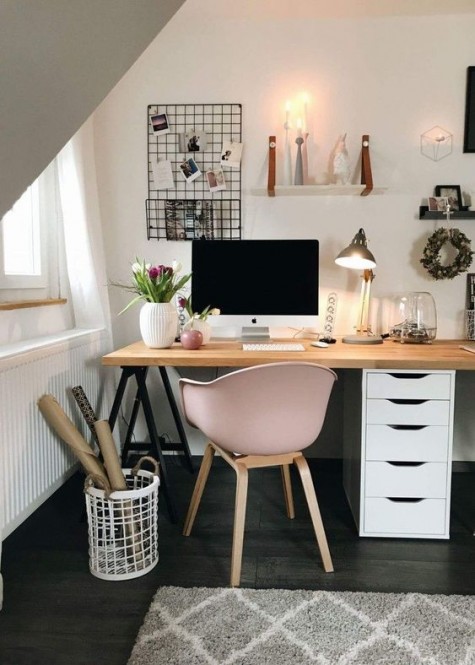 a modern and comfy desk made of an IKEA Alex unit, black trestle legs and a wooden tabletop is a cool idea
