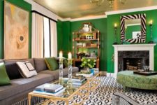 17 a super bold living room done with emerald, animal prints and a gold ceiling for a chic look