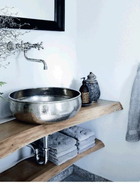a hammered metal sink is a bold idea that will impress and inspire