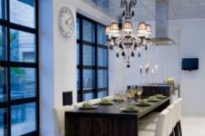 18 a super shiny patterned silver ceiling adds interest and a whimsy touch to the dining space