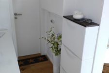 19 a tiny kitchen done with IKEA Trones cabinets and black tabletops for a contemporary feel