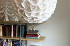 22 a sculptural paper orb light made of an IKEA Regolit lampshade and some cupcake lines