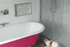 an elegant pink bathtub is a great addition to a neutral bathroom
