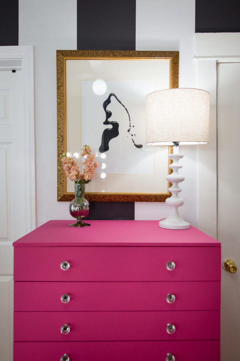 a hot pink dresser made of an IKEA Alex drawer unit with glass knobs for a girlish space