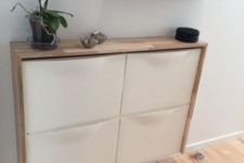 25 an IKEA Trones storage shelf with a waterfall wood countertop as a floating entryway shelf for a contemporary space