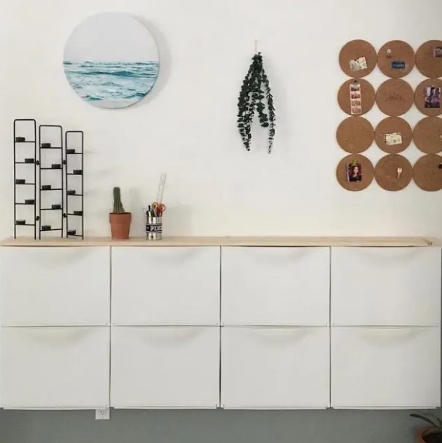 a white IKEA Trones piece with a stained countertop and some decor is a lovely idea for a Scandinavian entryway