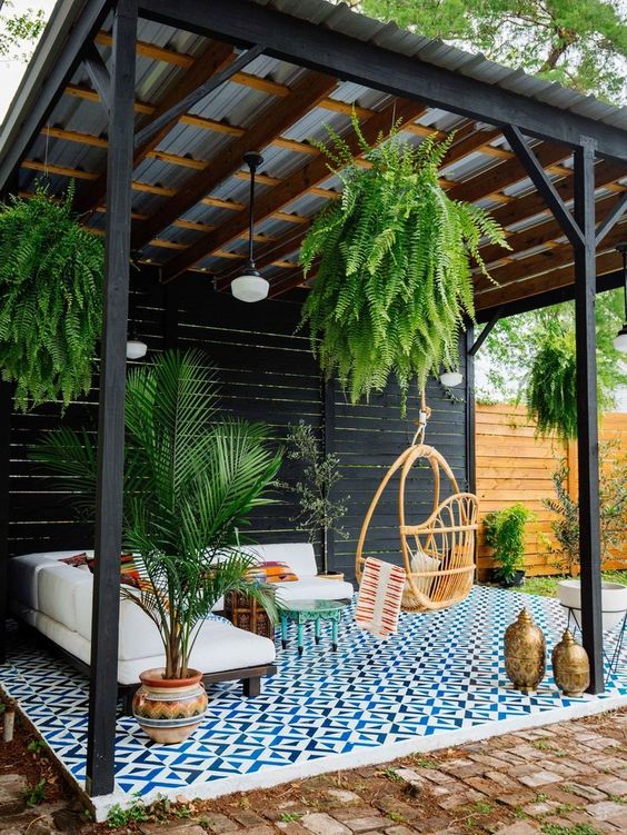 bricks all over the patio and blue mosaic tiles in the lounge zone highlights the space