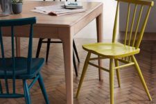 02 make your simple chairs catchy using different paints to create a bold dining space