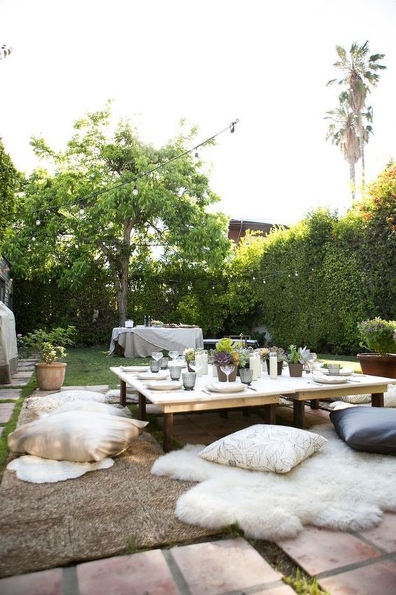 make your floor welcoming and soft with various rugs, pillows and fur throws on the tiles