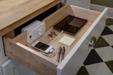 07 a drawer in one of the cabinets used as a charging station is a cool idea for a modern kitchen