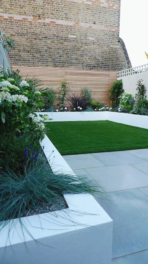 white concrete garden bed edging is a stylish idea with a minimalist feel, which will accent your plants