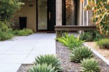 09 aloe polyphylla and asparagus ferns mixed up with pebbles for a chic and modern front yard