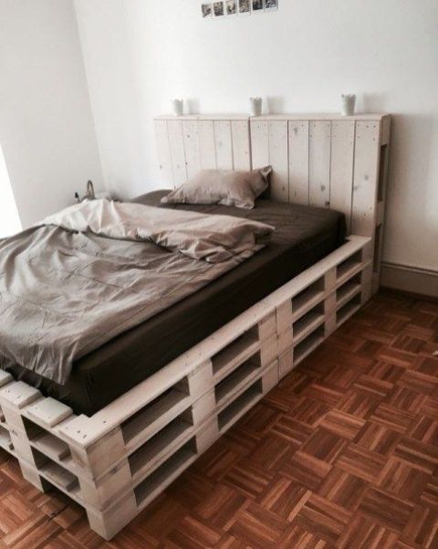 such a raised pallet bed with a headboard gives you much more storage inside and makes it warmer to sleep on it