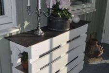 16 a chic pallet console table of two pieces painted white and a black tabletop looks cool and elegant
